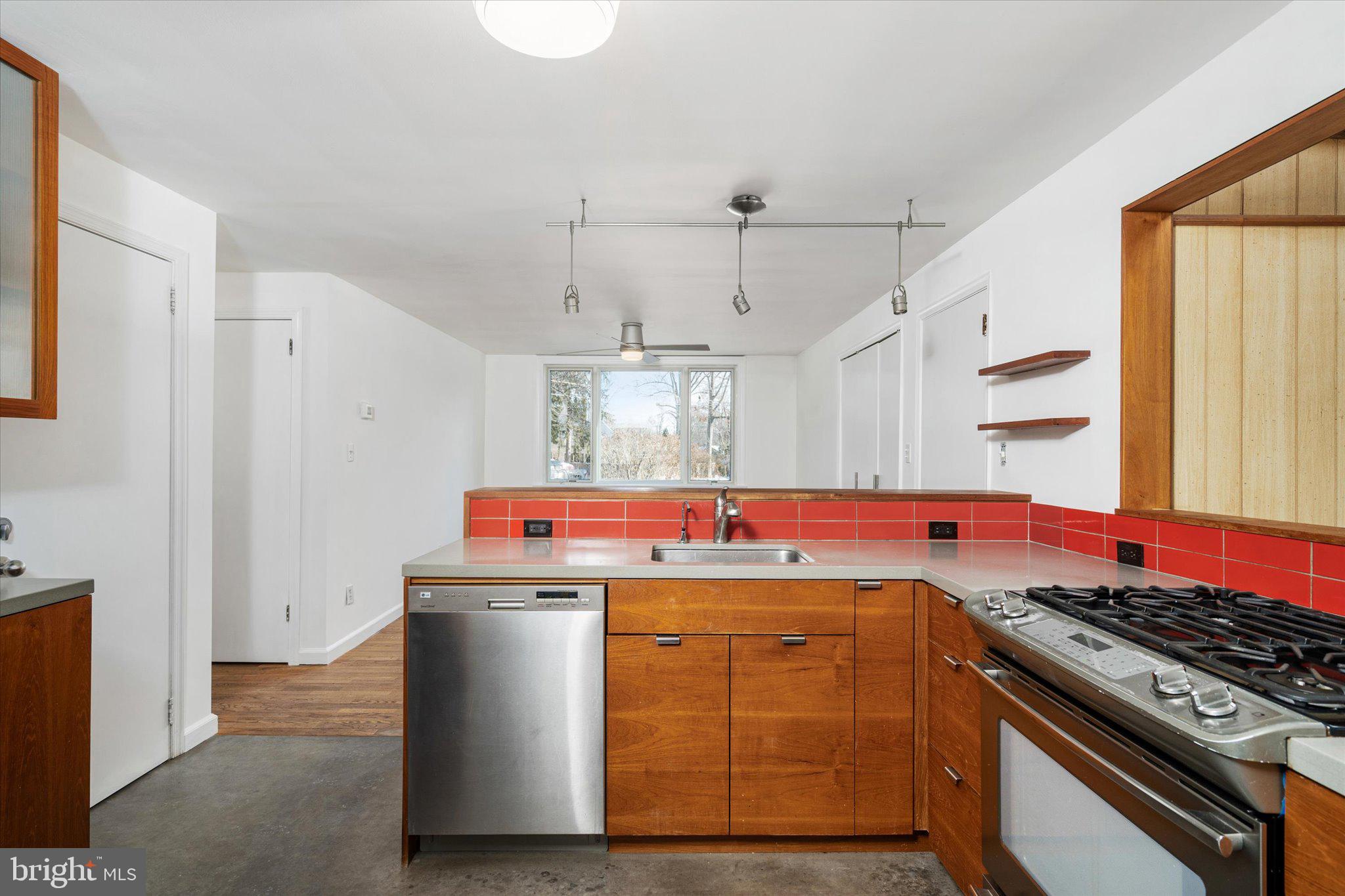 331 Hamilton Avenue Princeton, NJ 08540 - Photo 13 of 31 a kitchen with stainless steel appliances granite countertop a stove and a refrigerator