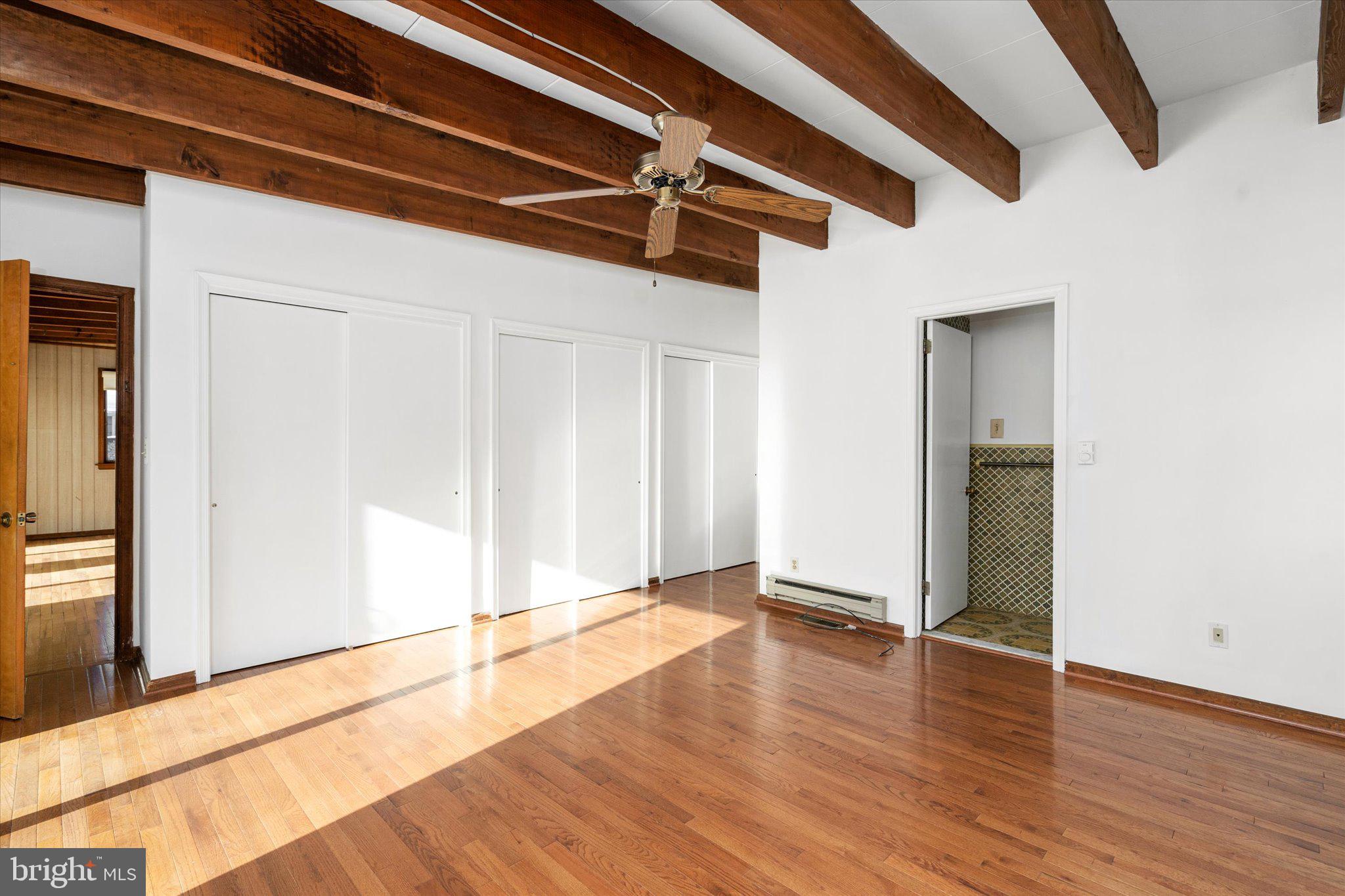 331 Hamilton Avenue Princeton, NJ 08540 - Photo 17 of 31 a view of an empty room with wooden floor