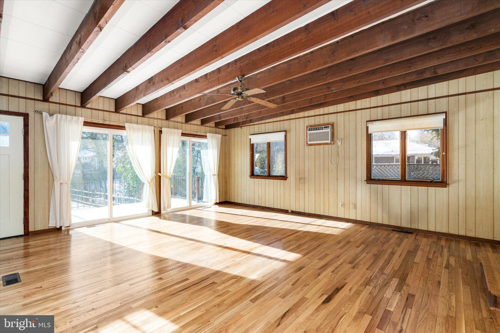 331 Hamilton Avenue Princeton, NJ 08540 - Photo 5 of 31 a view of an empty room with wooden floor and a window