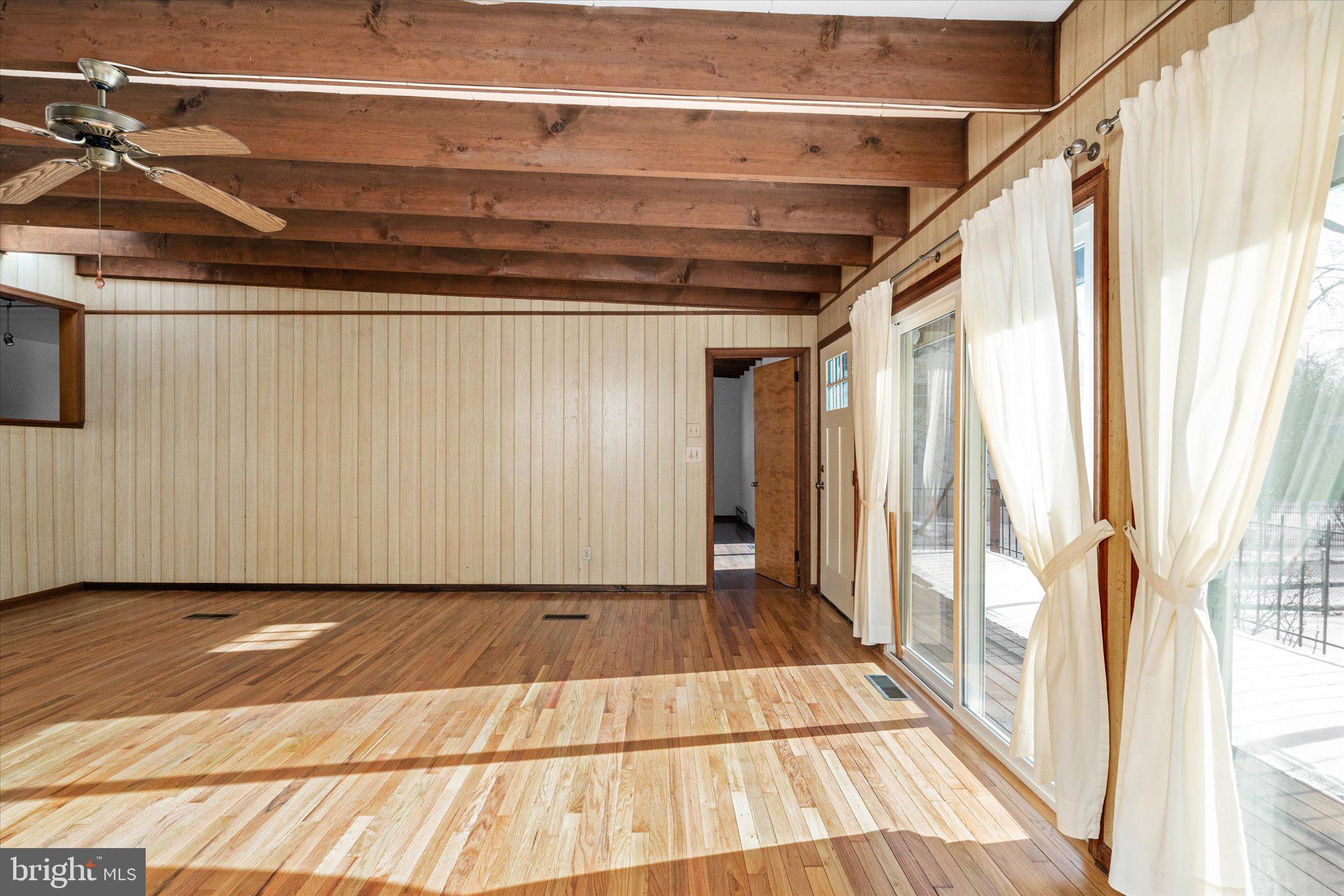 331 Hamilton Avenue Princeton, NJ 08540 - Photo 6 of 31 a view of a room with wooden floor and large windows