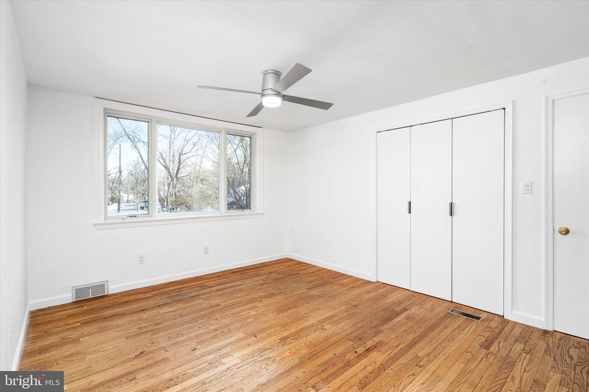 331 Hamilton Avenue Princeton, NJ 08540 - Photo 8 of 31 a view of empty room with wooden floor and fan