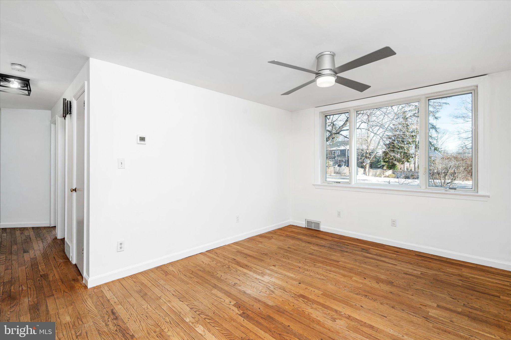 331 Hamilton Avenue Princeton, NJ 08540 - Photo 9 of 31 a view of empty room with wooden floor and fan
