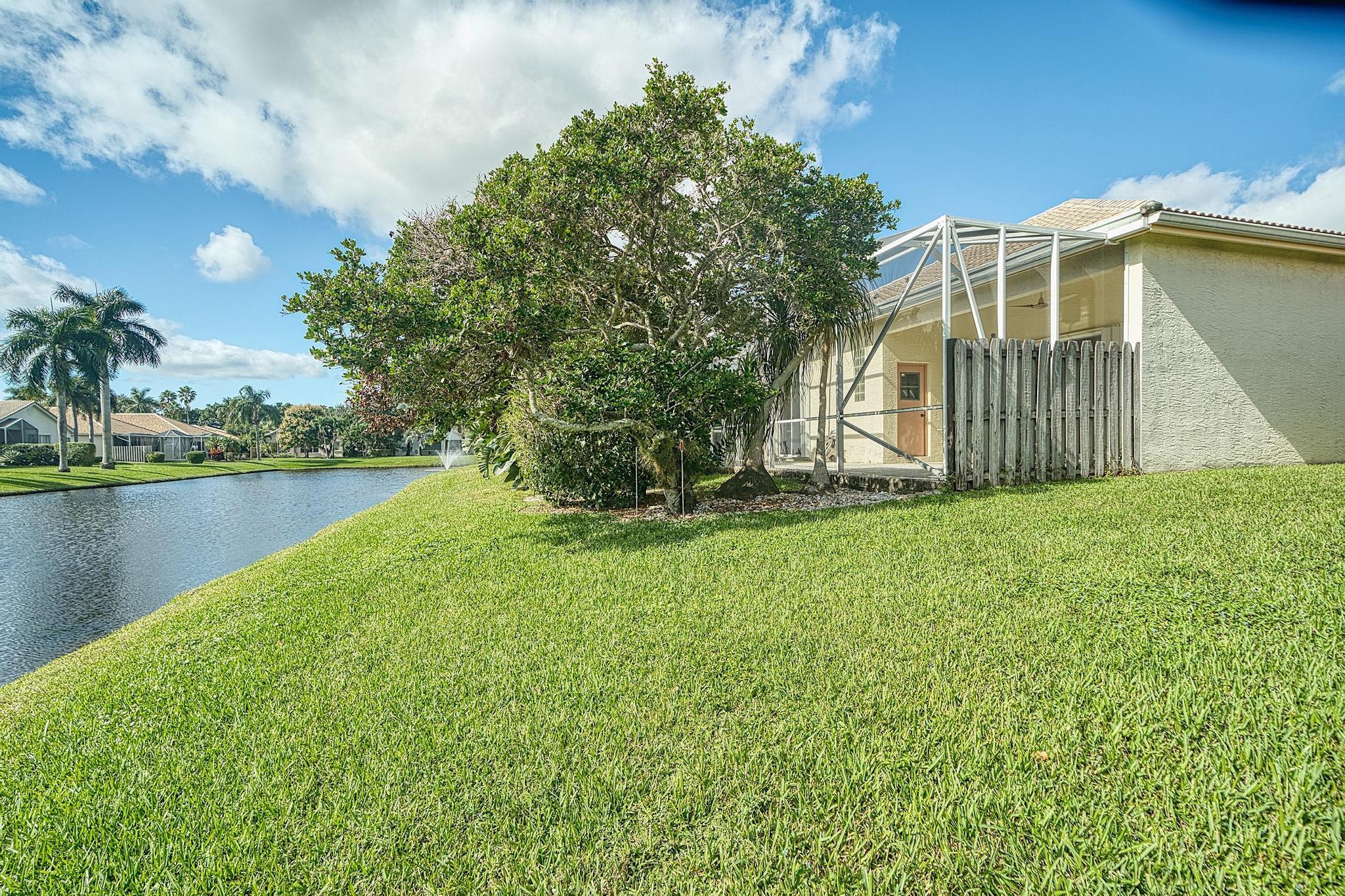 7507 Eagle Point Drive Delray Beach, FL 33446 - Photo 41 of 49 a view of a house with backyard and garden