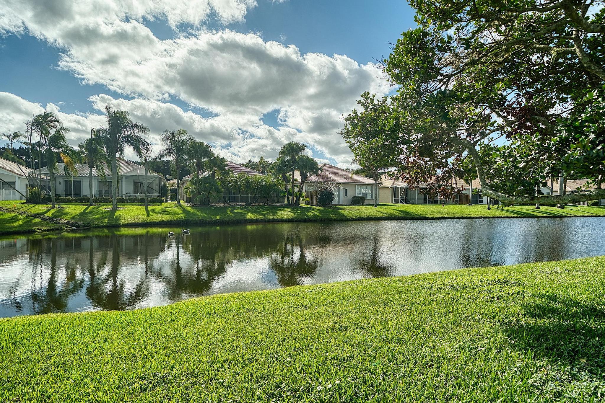 7507 Eagle Point Drive Delray Beach, FL 33446 - Photo 42 of 49 a view of a lake