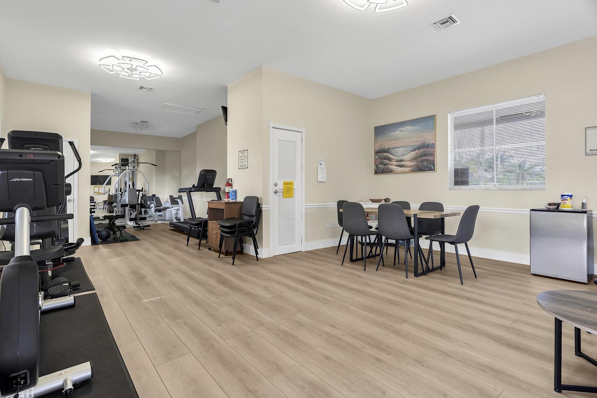 7507 Eagle Point Drive Delray Beach, FL 33446 - Photo 46 of 49 a living room with furniture and wooden floor