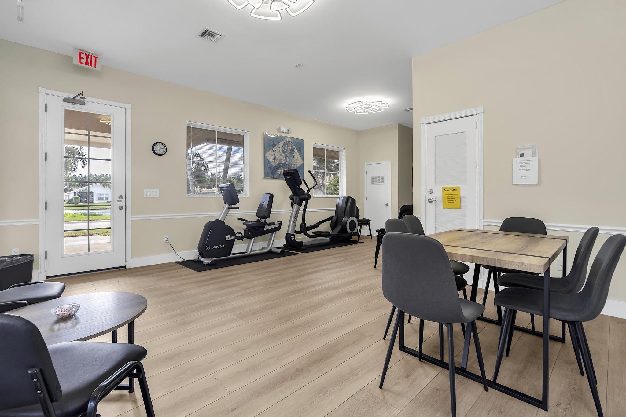 7507 Eagle Point Drive Delray Beach, FL 33446 - Photo 47 of 49 a view of a livingroom with furniture and a workspace