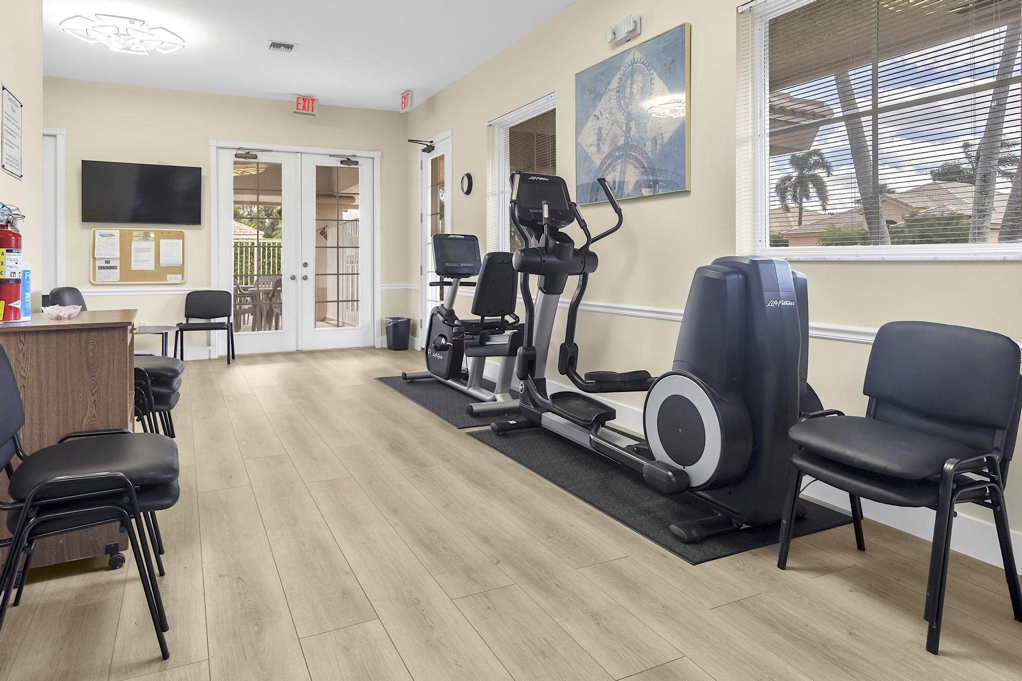 7507 Eagle Point Drive Delray Beach, FL 33446 - Photo 49 of 49 a view of a room with gym equipment