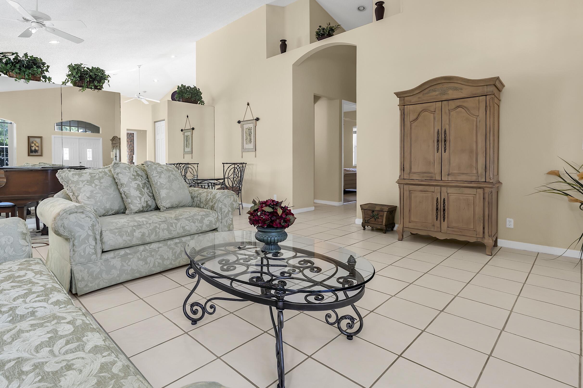 7507 Eagle Point Drive Delray Beach, FL 33446 - Photo 7 of 49 a living room with furniture and wooden floor