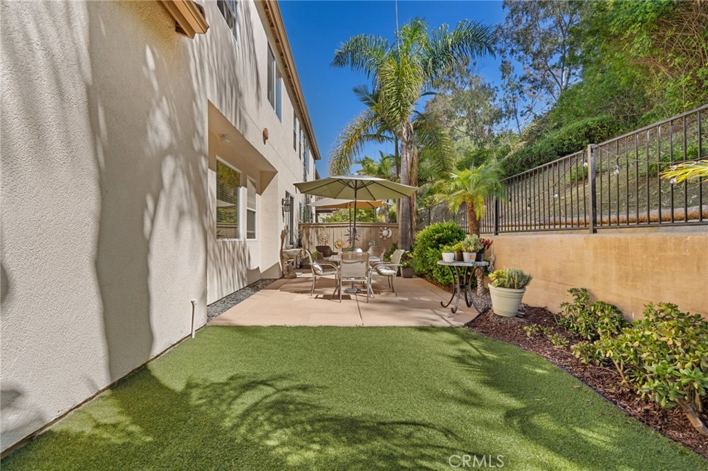 3073 Via Maximo Carlsbad, CA 92009 - Photo 4 of 21 Exterior backyard artificial turn and garden