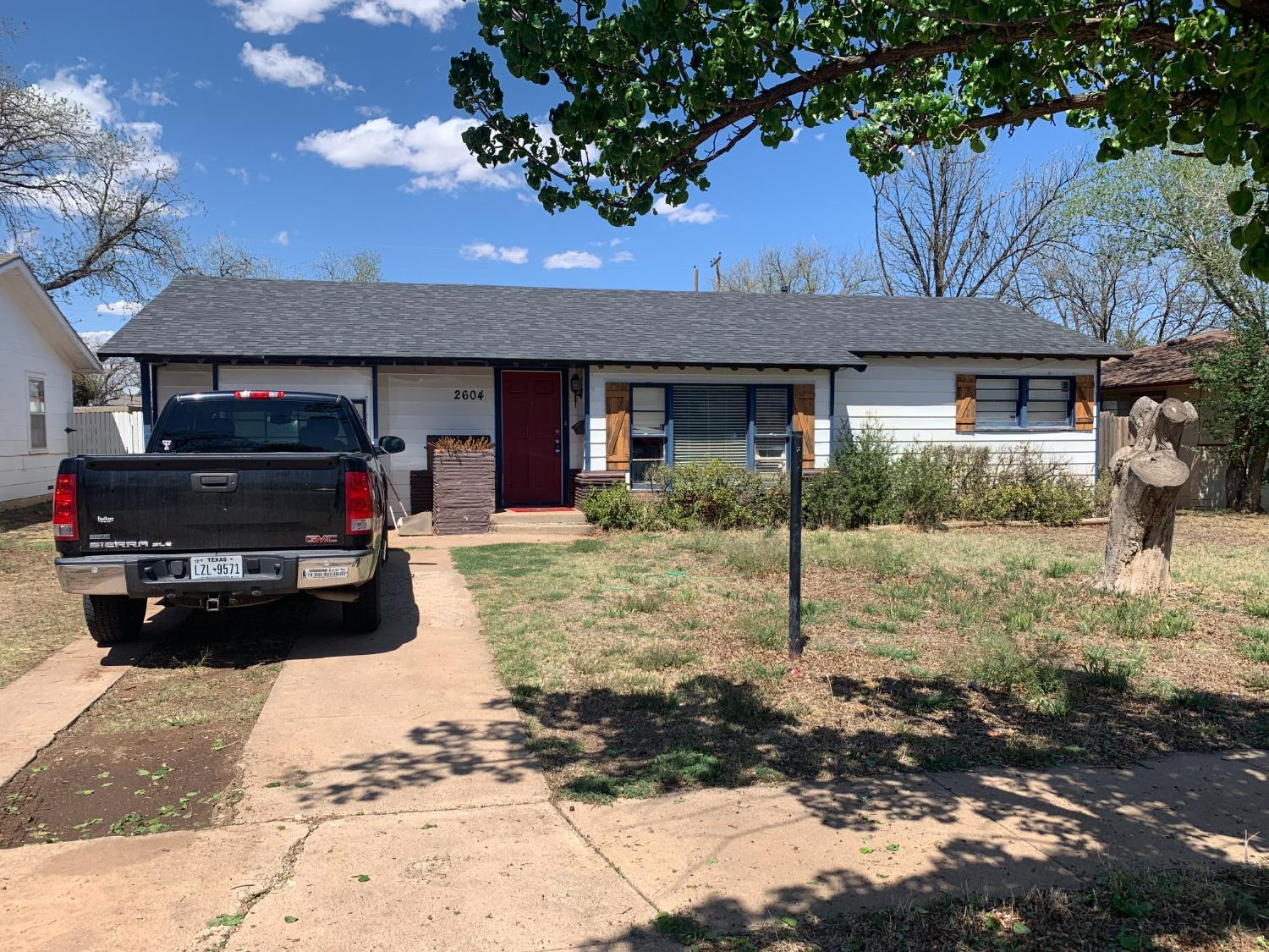 2604 44th Street Lubbock, TX 79413 - Photo 1 of 10 a house view with a garden space