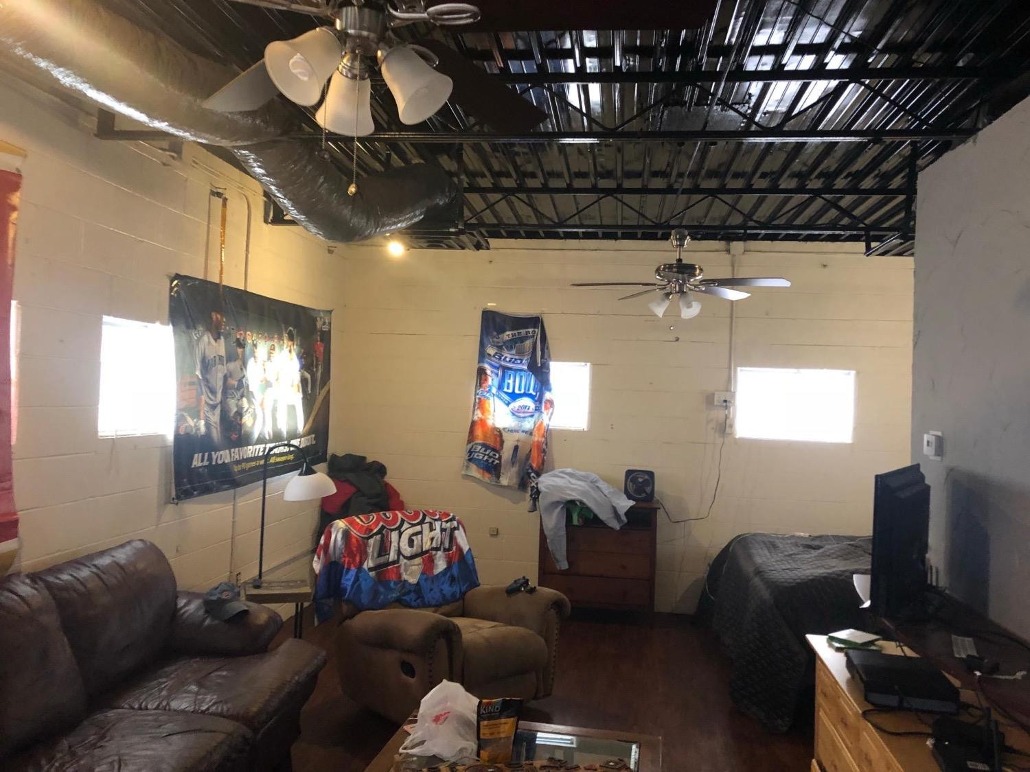 2604 44th Street Lubbock, TX 79413 - Photo 6 of 10 a living room with furniture