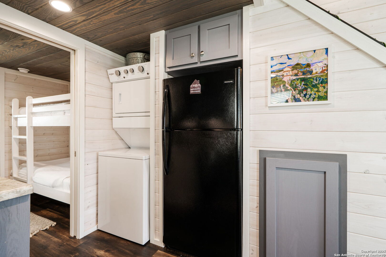 5386 Ranch Road 1376, Unit 172 Fredericksburg, TX 78624 - Photo 13 of 34 a close view of a refrigerator and cabinets