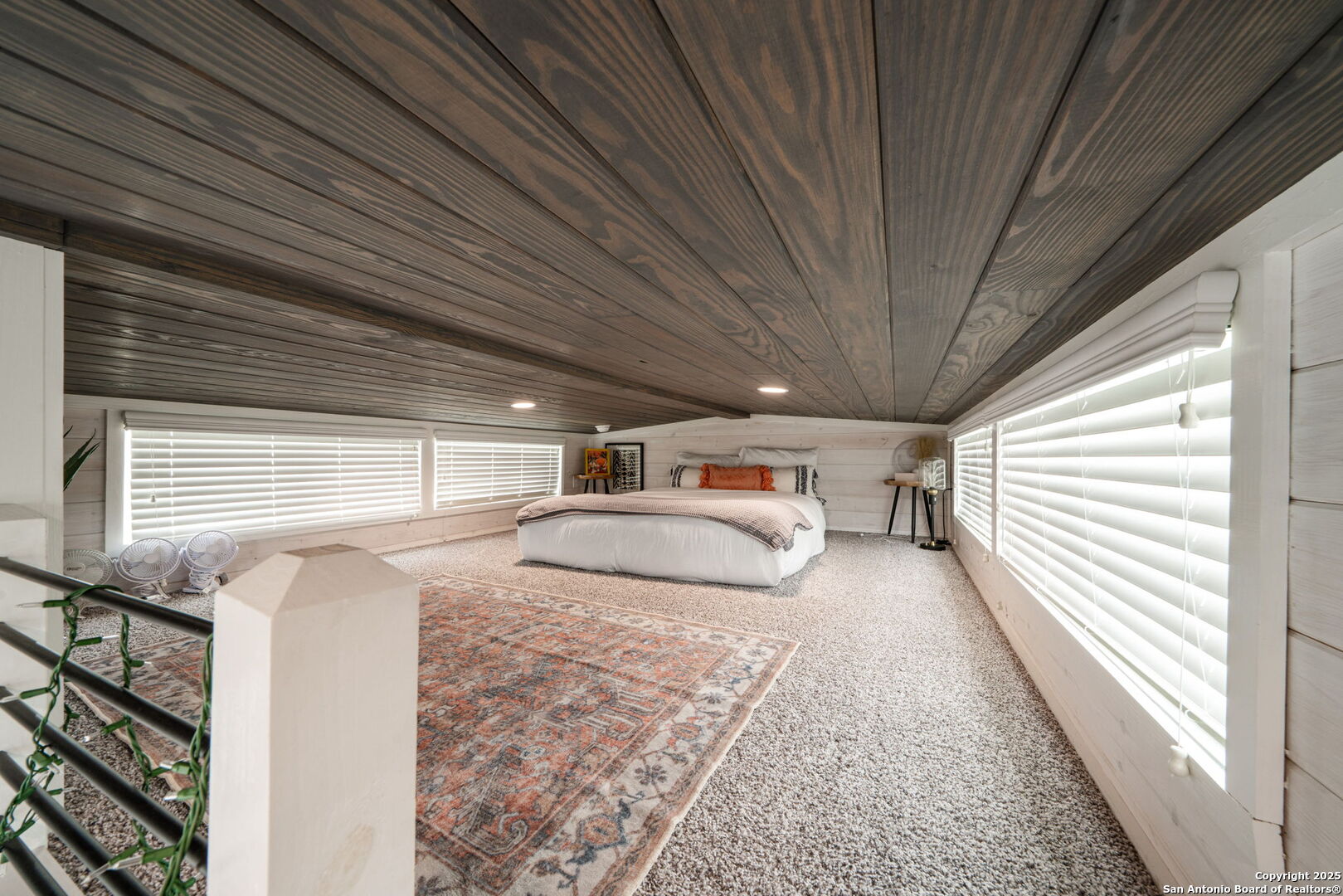 5386 Ranch Road 1376, Unit 172 Fredericksburg, TX 78624 - Photo 17 of 34 a view of a house with a balcony