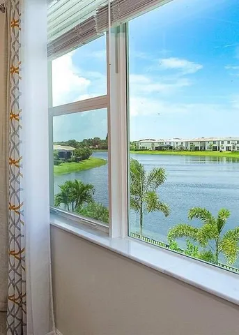 a view of a balcony with lake view