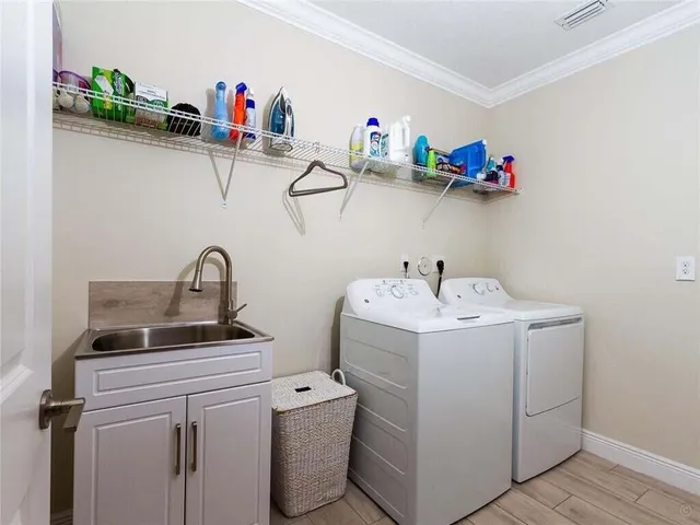 a utility room with dryer and washer