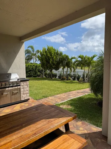 a view of yard with an outdoor space