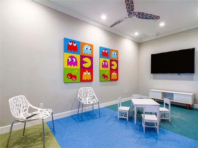 a view of a backyard with sitting area