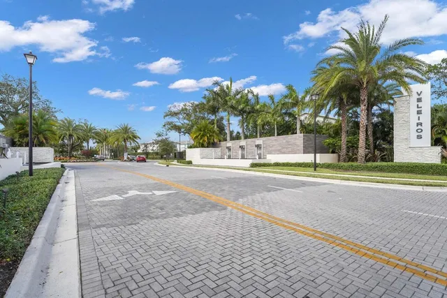 a living room with furniture and a ceiling fan