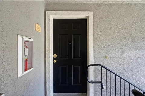 a view of hallway with stairs