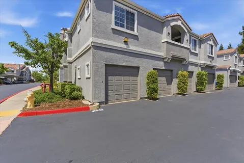 front view of a house with a street