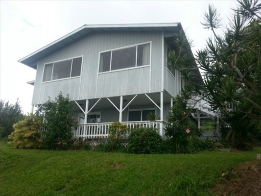 82-6106 D Road Captain Cook, HI 96704 - Photo 3 of 25 a view of a house with backyard and garden