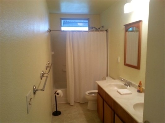 82-6106 D Road Captain Cook, HI 96704 - Photo 10 of 25 a bathroom with a granite countertop sink and a mirror