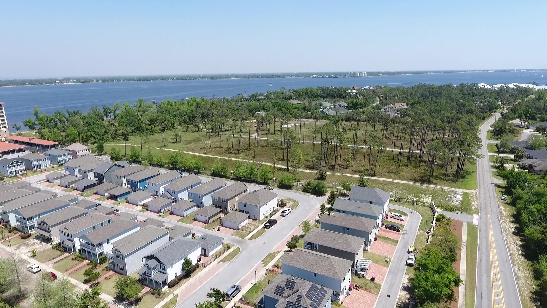 4700 Magnolia Beach Road Panama City Beach, FL 32408 - Photo 17 of 23 an aerial view of a house with a lake view