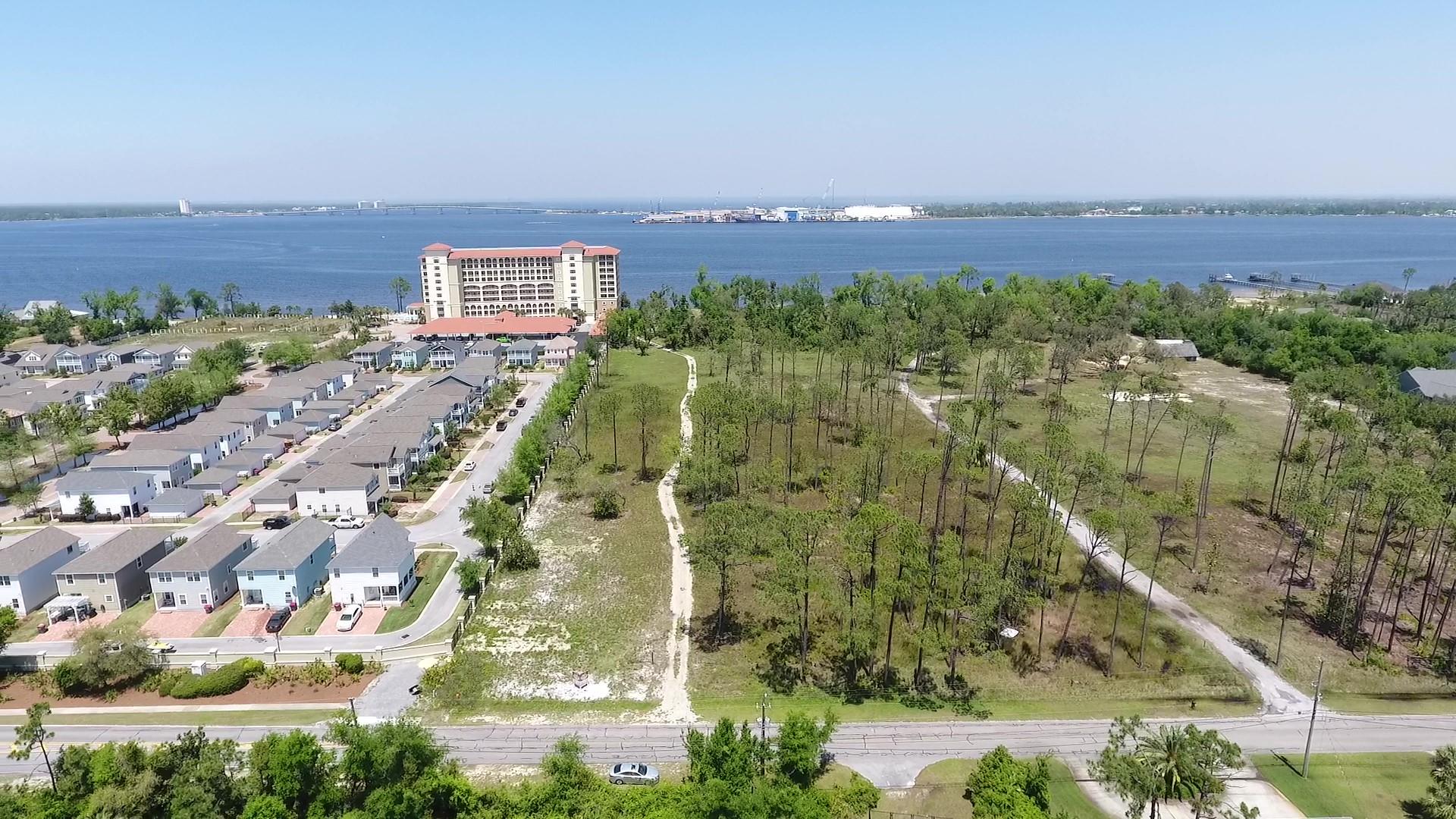 4700 Magnolia Beach Road Panama City Beach, FL 32408 - Photo 3 of 23 an aerial view of residential building and car parked