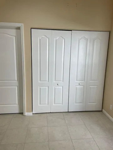 a view of hallway with windows