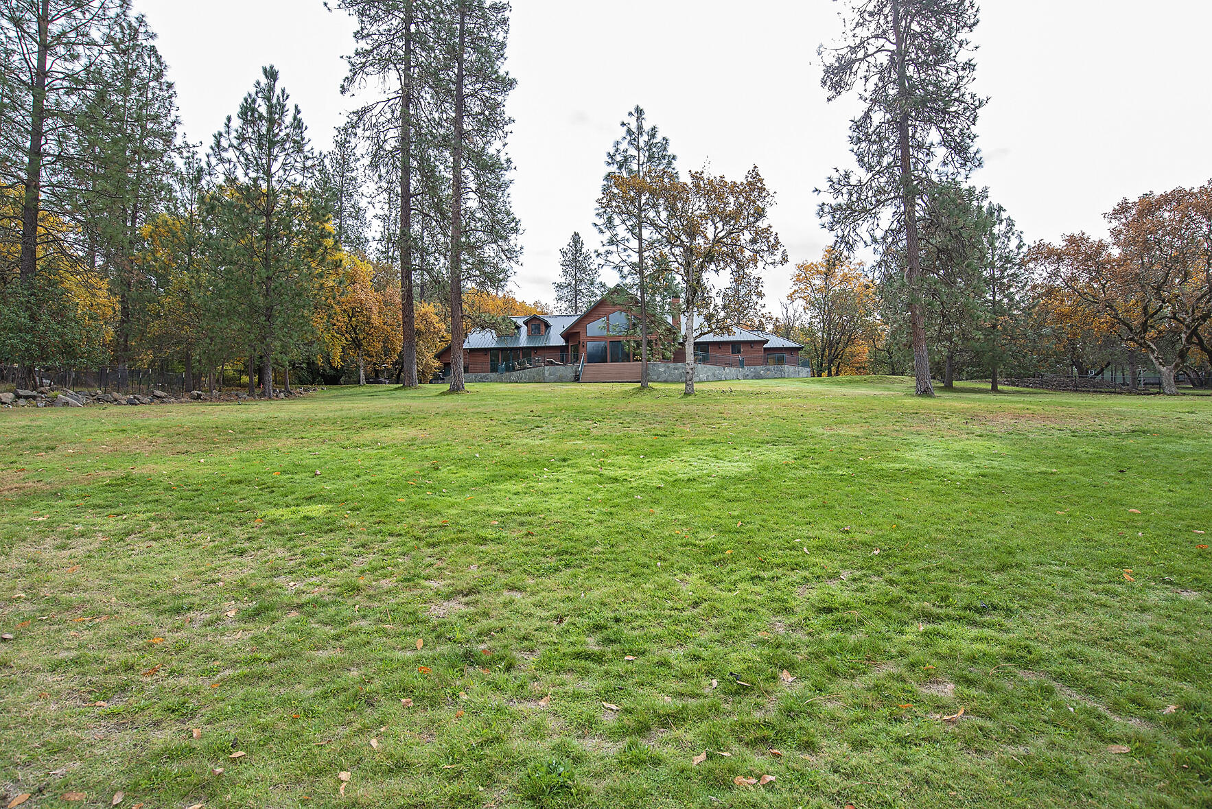 1665 Upper River Road Gold Hill, OR 97525 - Photo 41 of 48 a backyard of a house with lots of green space