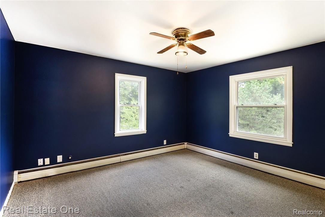 9780 Mcgregor Road Pinckney, MI 48169 - Photo 11 of 34 Spacious master bedroom