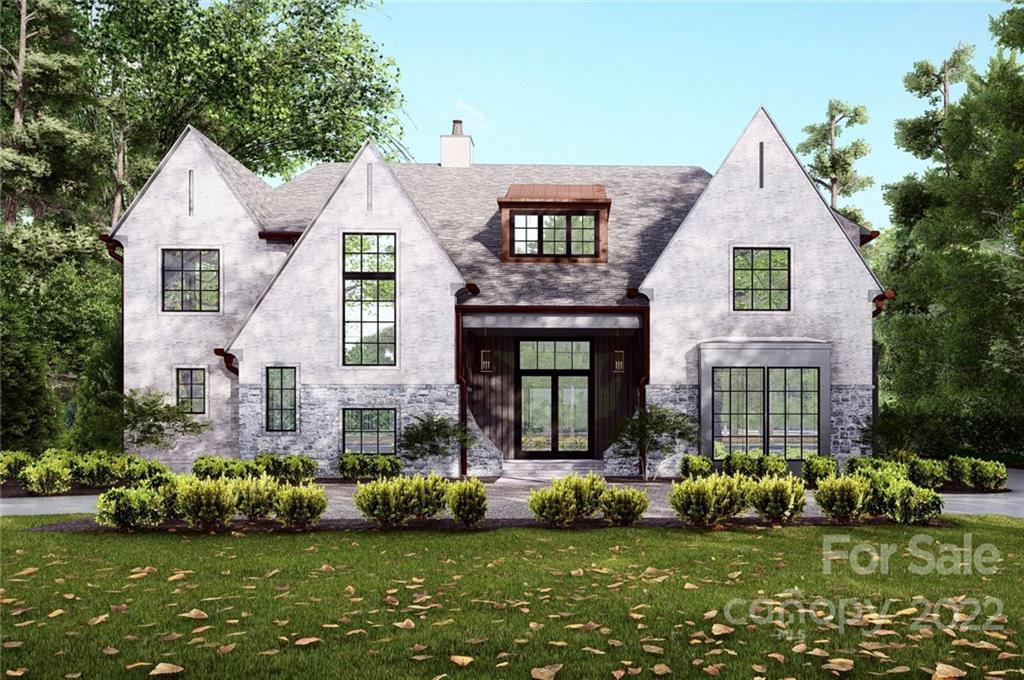 2027 Ferncliff Road Charlotte, NC 28211 - Photo 1 of 46 a front view of a house with a garden and plants