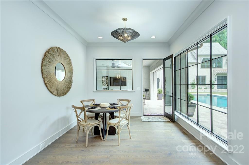 2027 Ferncliff Road Charlotte, NC 28211 - Photo 20 of 46 a view of a dining room with furniture window and outside view
