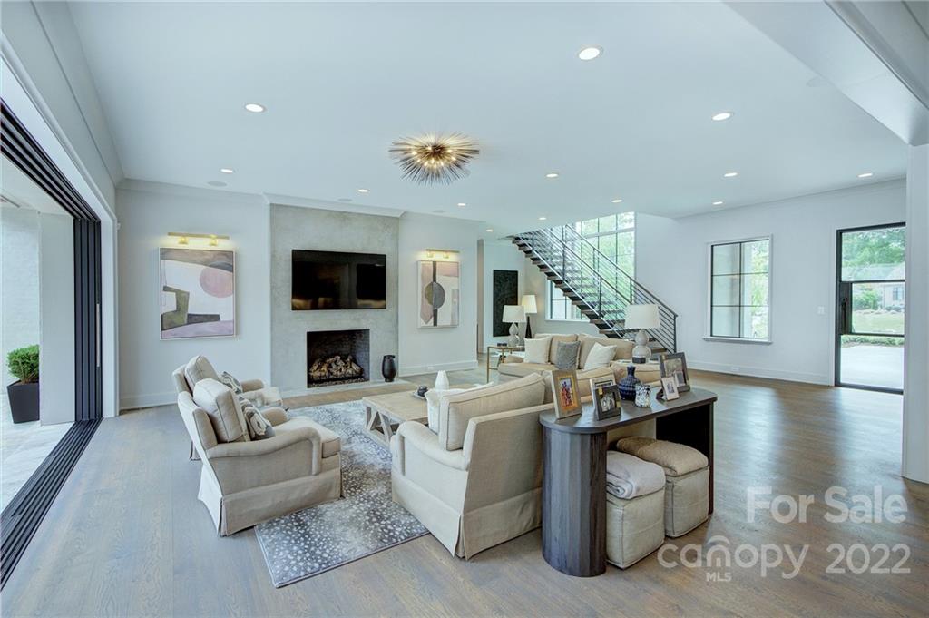 2027 Ferncliff Road Charlotte, NC 28211 - Photo 21 of 46 a living room with furniture and a fireplace