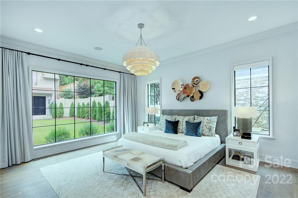 2027 Ferncliff Road Charlotte, NC 28211 - Photo 29 of 46 a bedroom with a bed and a window