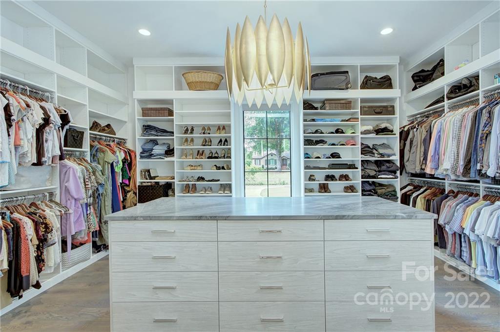 2027 Ferncliff Road Charlotte, NC 28211 - Photo 34 of 46 a view of walk in closet with clothes and shoes