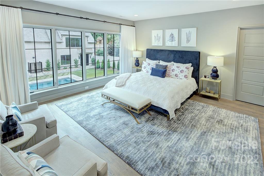 2027 Ferncliff Road Charlotte, NC 28211 - Photo 40 of 46 a bed sitting in a bedroom next to a window