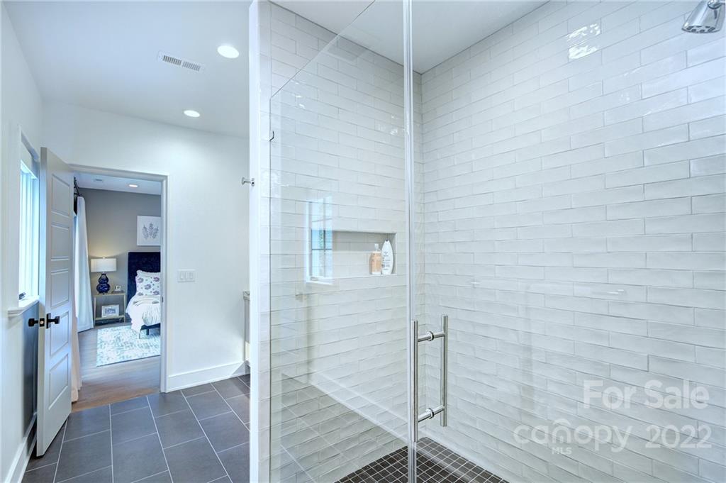 2027 Ferncliff Road Charlotte, NC 28211 - Photo 42 of 46 a bathroom with a shower and a sink