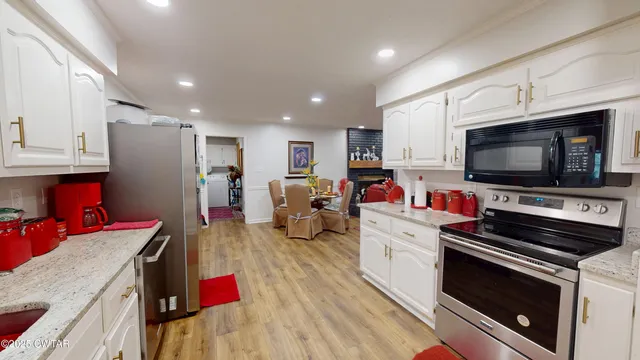 a bathroom with a tub and a shower