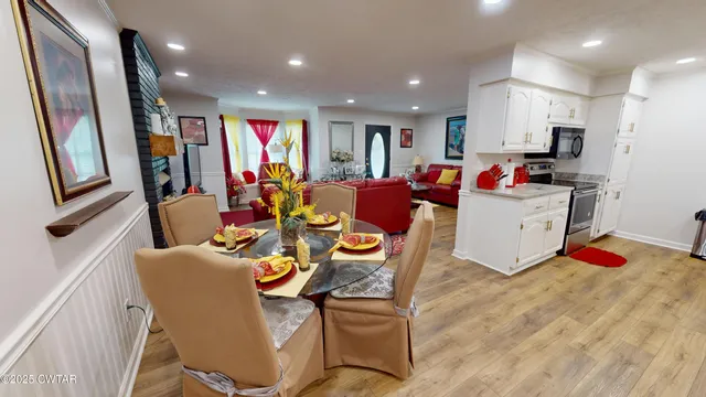 a bathroom with a sink vanity and a mirror