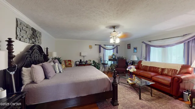 a white toilet sitting next to a shower curtain