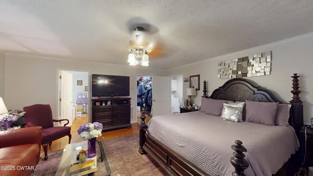 a view of a dining room with furniture and window