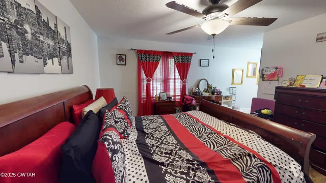 a view of parking garage with cars and garage