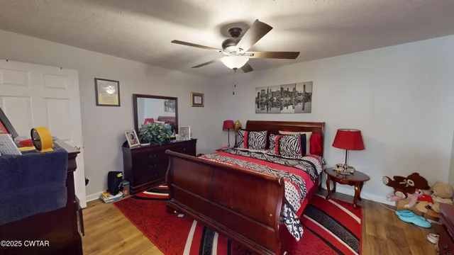 a view of parking garage with cars