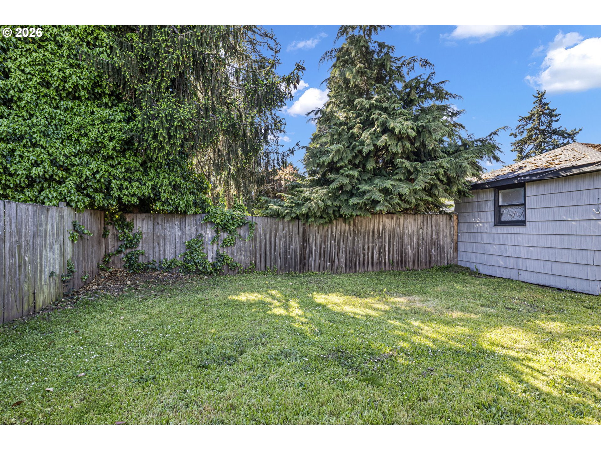 1008 Coburg Road Eugene, OR 97401 - Photo 19 of 46 a view of a backyard with a barn