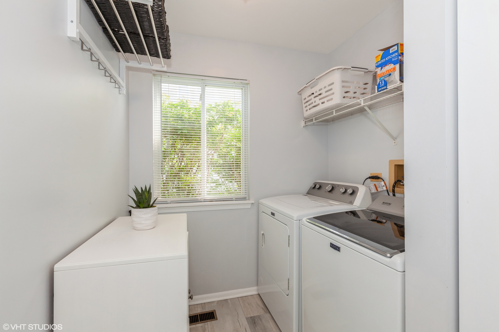 724 Wildflower Circle Naperville, IL 60540 - Photo 14 of 31 a utility room with dryer and washer