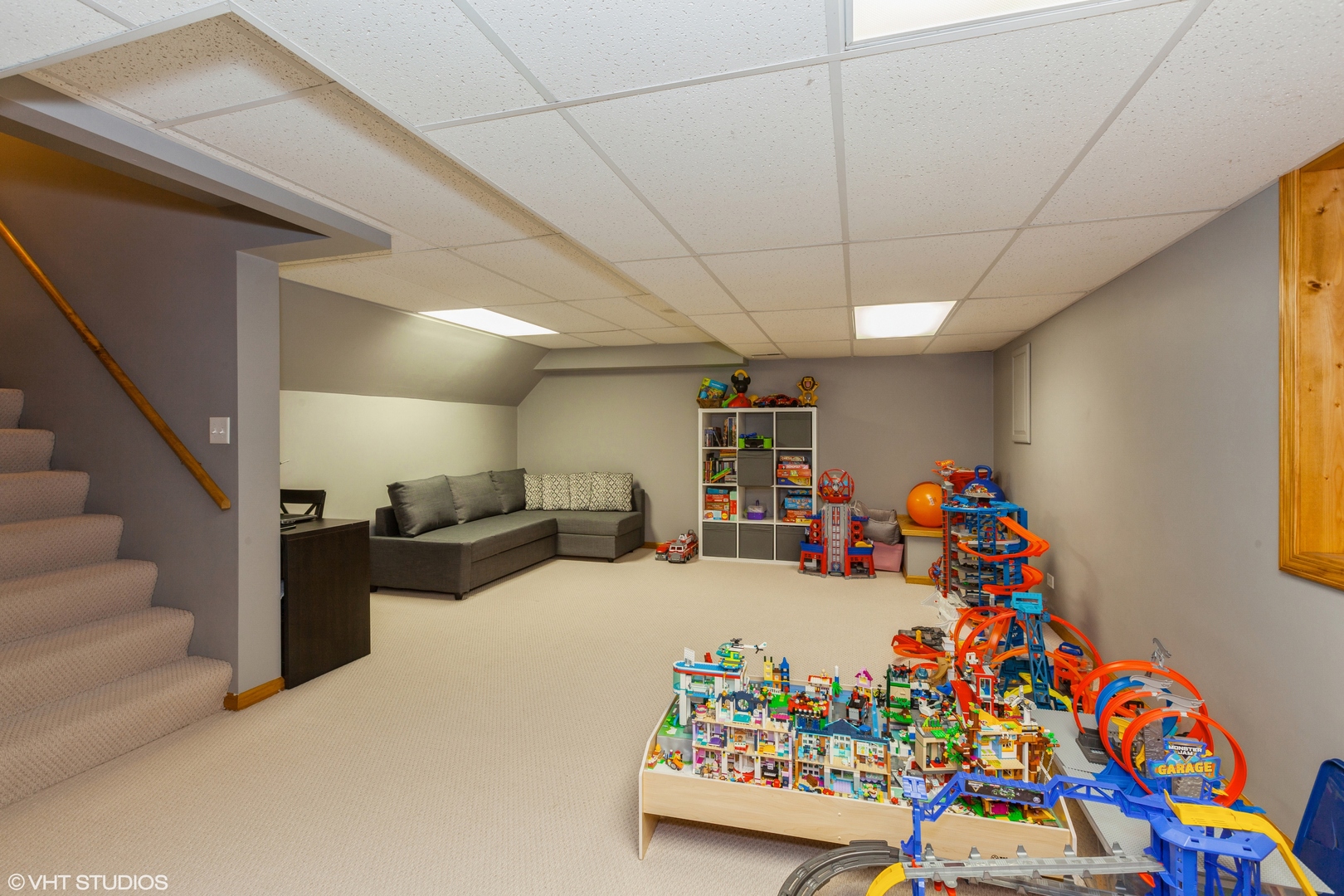 724 Wildflower Circle Naperville, IL 60540 - Photo 15 of 31 a bed room with lots of baby toys