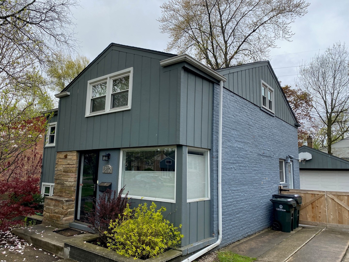 640 Long Road Glenview, IL 60025 - Photo 3 of 3 a front view of a house with garden