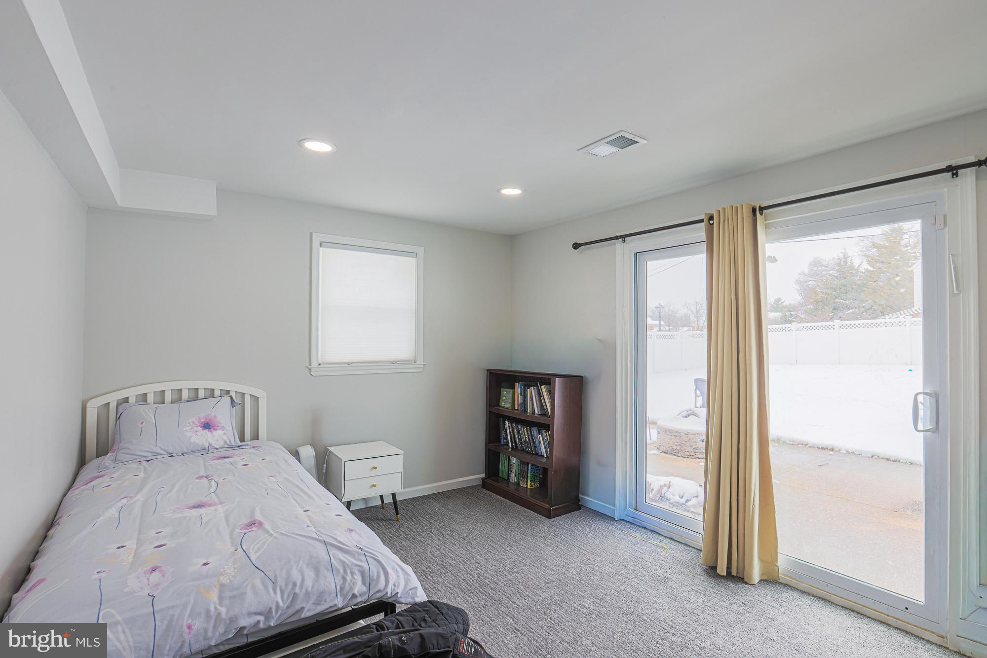 6600 Linco Avenue Baltimore, MD 21209 - Photo 11 of 21 Bright and airy bedroom with outdoor access.