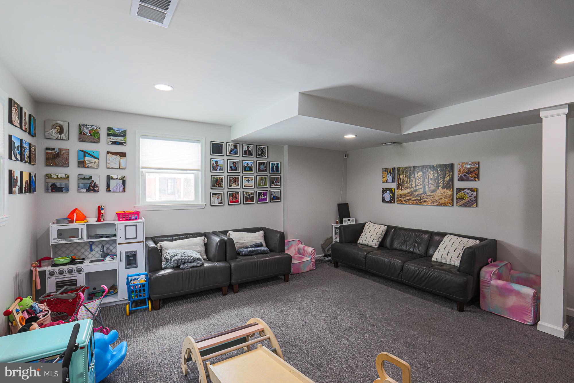 6600 Linco Avenue Baltimore, MD 21209 - Photo 15 of 22 a living room with furniture and a couch